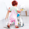 cute,toddler,baby,boy,running,away,along,the,path,at