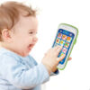 mother with baby daughter works with a computer and phone