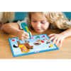 little girl coloring on a tablet