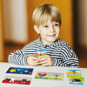 a happy boy is learning music instruments while sitting in kinde