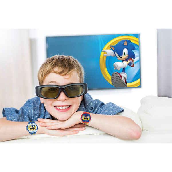 little boy wearing 3d glasses and watching television