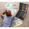 little boy drawing on the floor in his room