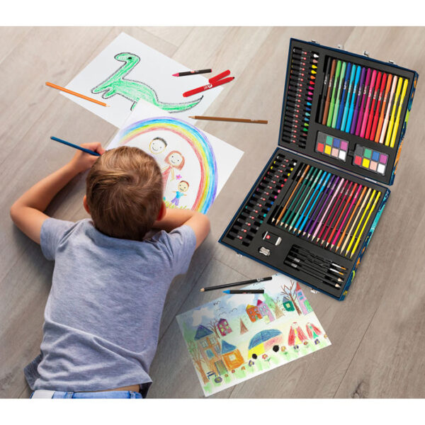 little boy drawing on the floor in his room