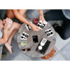 three young friends playing cards at cafe