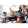 group of friends relaxing and playing cards together. young people hanging out together