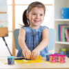 little kid toddler girl creating toys from playdough